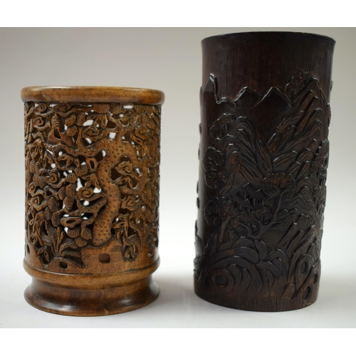 498 - FOUR 19TH/20TH CENTURY CHINESE CARVED WOOD BRUSH POTS Late Qing. Largest 15 cm high. (4)