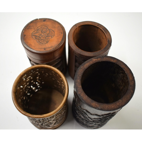 498 - FOUR 19TH/20TH CENTURY CHINESE CARVED WOOD BRUSH POTS Late Qing. Largest 15 cm high. (4)