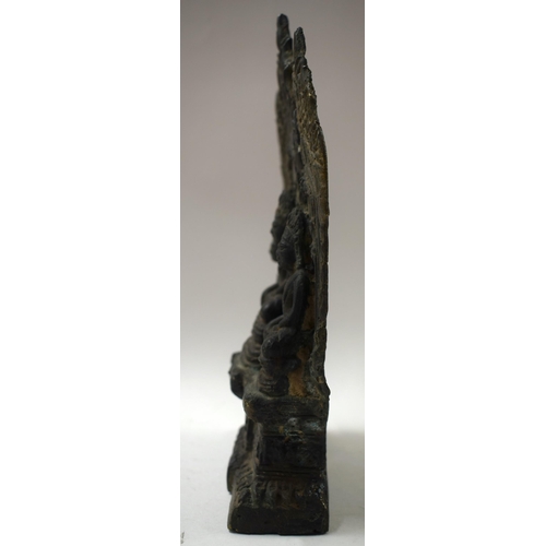 521 - A TIBETAN BRONZE FIGURAL GROUP 15 cm x 25 cm