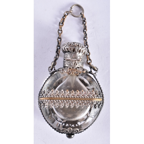 530 - AN EARLY 19TH CENTURY FRENCH SILVER AND GILT CRYSTAL GLASS SCENT BOTTLE decorated with a central por... 