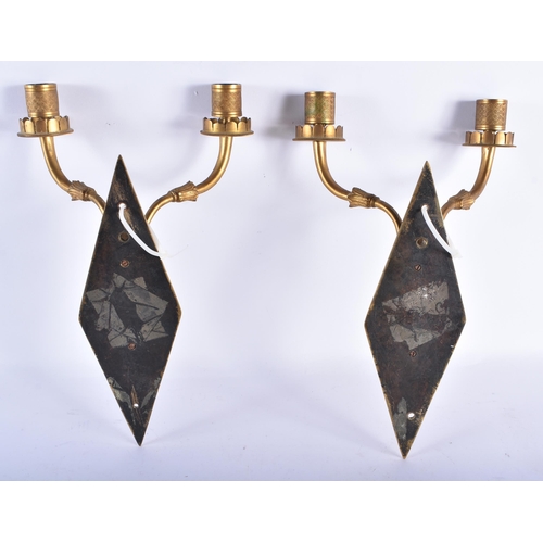 532 - A LOVELY PAIR OF EARLY 19TH CENTURY ORMOLU AND PATINATED BRONZE WALL SCONCES modelled each with a si... 