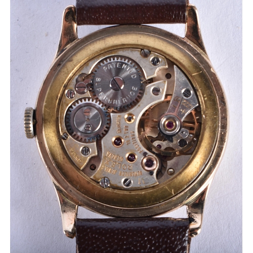 542 - A RARE 9 CARAT GOLD CASED VINTAGE ROLEX WRISTWATCH with raised gilt numerals, the back case stamped ... 