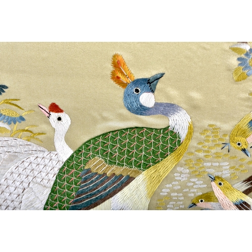 545 - A LARGE LATE 19TH CENTURY CHINESE SILK EMBROIDERED BIRD PANEL Late Qing, decorated with brilliantly ... 