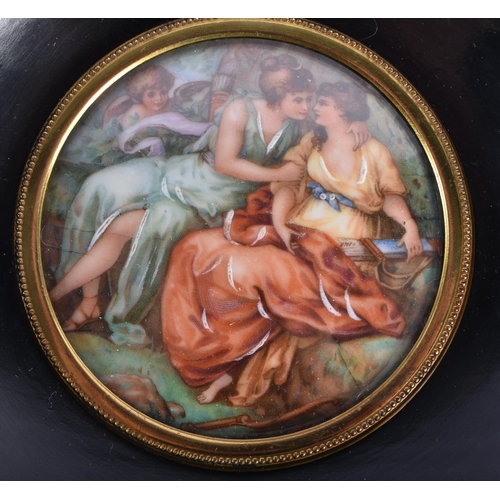 555 - A PAIR OF ANTIQUE FRAMED CLASSICAL PORCELAIN PLAQUES. 13 cm square.