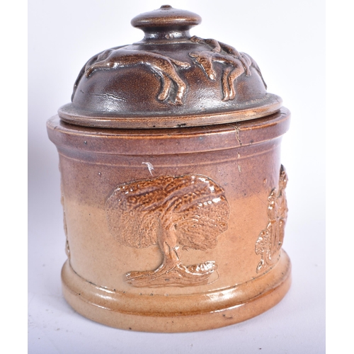 559 - AN UNUSUAL ANTIQUE ENGLISH STONEWARE MEAT POT AND COVER together with a painted armorial tin shield.... 