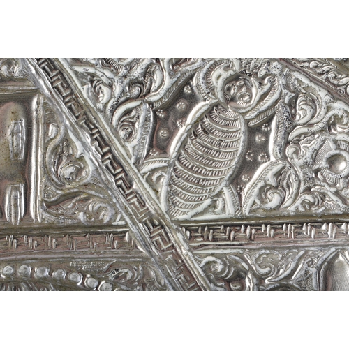 562 - A RARE LARGE 19TH CENTURY TIBETAN SILVER REPOUSSE CHARGER decorated with buddhistic emblems. 690 gra... 