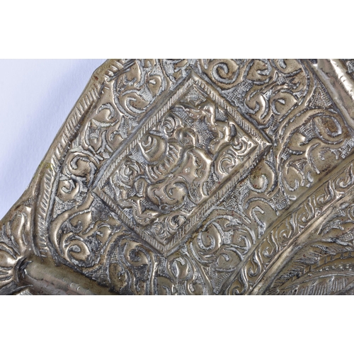 562 - A RARE LARGE 19TH CENTURY TIBETAN SILVER REPOUSSE CHARGER decorated with buddhistic emblems. 690 gra... 