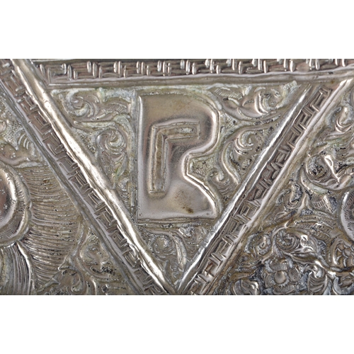 562 - A RARE LARGE 19TH CENTURY TIBETAN SILVER REPOUSSE CHARGER decorated with buddhistic emblems. 690 gra... 