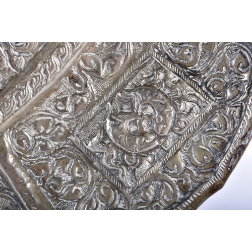 562 - A RARE LARGE 19TH CENTURY TIBETAN SILVER REPOUSSE CHARGER decorated with buddhistic emblems. 690 gra... 