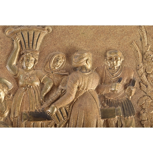 566 - A MID 19TH CENTURY FRENCH GILT BRONZE REPOUSSE PANEL depicting figures within a landscape. 16.5 cm x... 