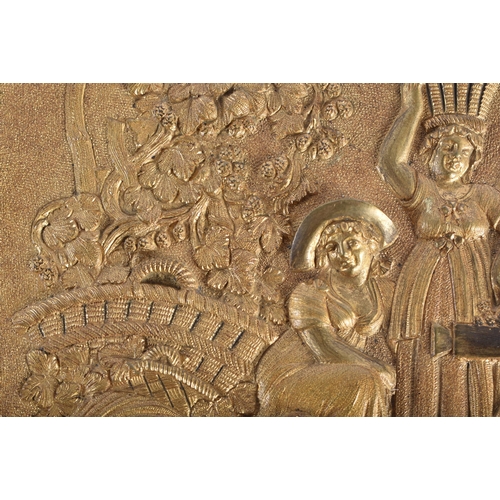 566 - A MID 19TH CENTURY FRENCH GILT BRONZE REPOUSSE PANEL depicting figures within a landscape. 16.5 cm x... 