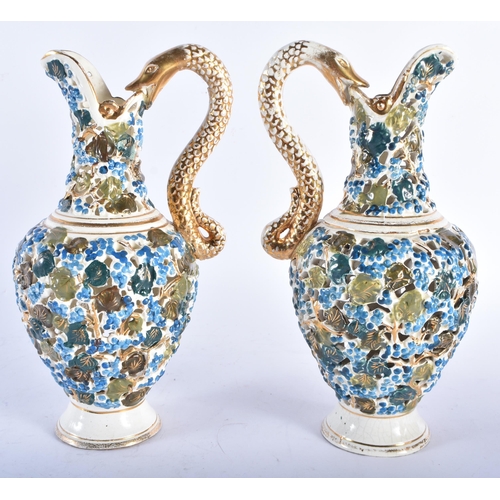 570 - A PAIR OF HUNGARIAN FISCHER RETICULATED POTTERY EWERS together with another vintage ceramic figure. ... 