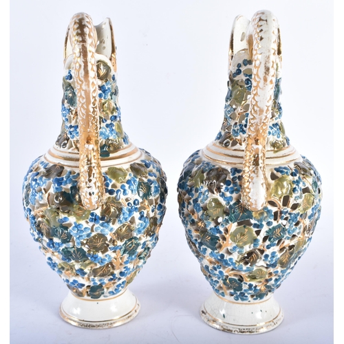 570 - A PAIR OF HUNGARIAN FISCHER RETICULATED POTTERY EWERS together with another vintage ceramic figure. ... 