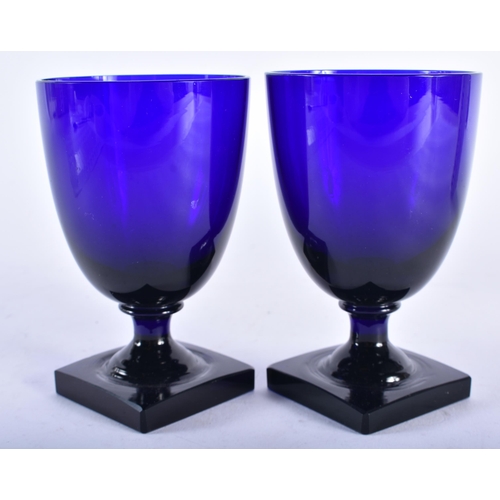 574 - A PAIR OF ANTIQUE BRISTOL BLUE GLASSES. 12.5 cm high.  WE ARE UNABLE TO OFFER IN HOUSE SHIPPING ON G... 