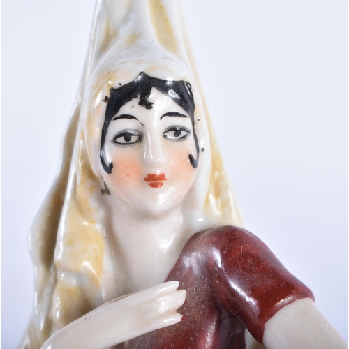 581 - A RARE 19TH CENTURY DRESSEL & KISTNER HALF DOLL PINCUSHION depicting a Spanish lady. 16 cm high.