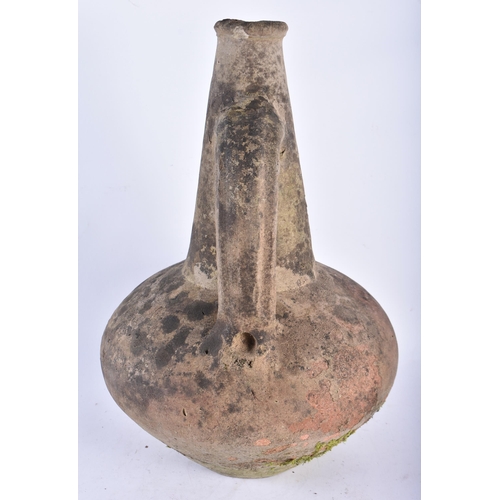 587 - AN UNUSUAL EARLY TERRACOTTA JUG After the Antiquity. 40 cm high.