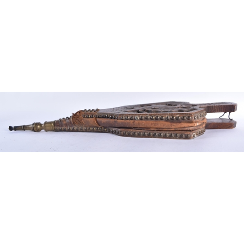 588 - A PAIR OF ARTS AND CRAFTS CARVED OAK DRAGON BELLOWS. 68 cm long.