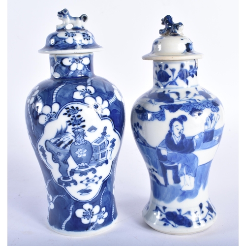 592 - TWO 19TH CENTURY CHINESE BLUE AND WHITE PORCELAIN VASES AND COVERS Qing. Largest 17 cm high. (2)