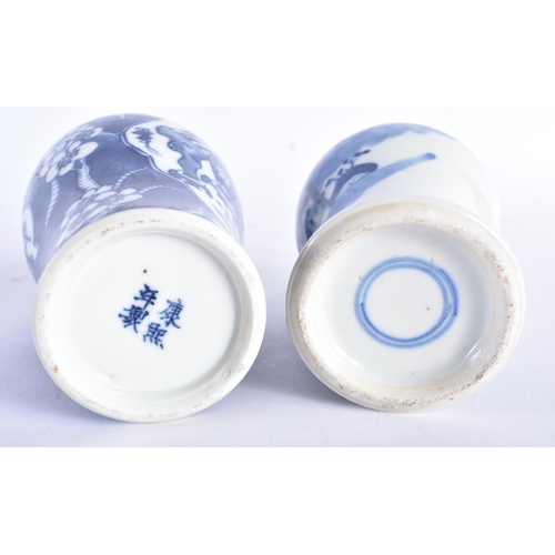 592 - TWO 19TH CENTURY CHINESE BLUE AND WHITE PORCELAIN VASES AND COVERS Qing. Largest 17 cm high. (2)