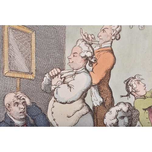 598 - AN EARLY 19TH CENTURY FRAMED ETCHING by Rowlandson, entitled A Barber Shop. 42 cm x 32 cm.