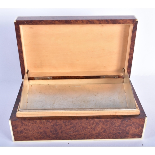 65 - AN EARLY 20TH CENTURY ENGLISH LONDON BURR WALNUT CIGAR BOX Attributed to Dunhill. 18 cm x 12 cm.