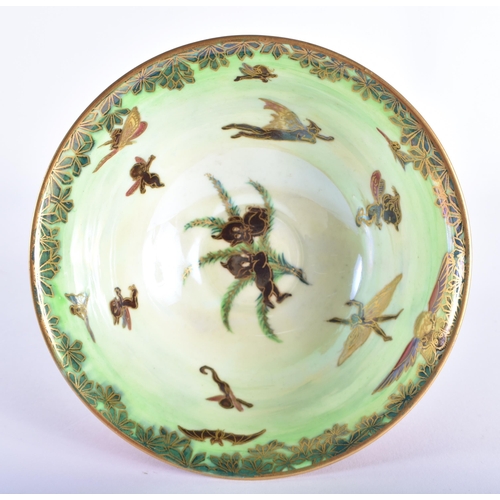 69 - A WEDGWOOD FAIRYLAND LUSTRE PIXIE BOWL by Daisy Makeig Jones. 12 cm wide.