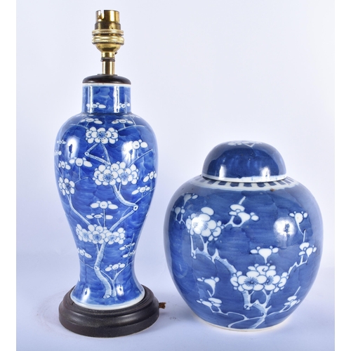 76 - A 19TH CENTURY CHINESE BLUE AND WHITE PORCELAIN PRUNUS LAMP together with a similar ginger jar. Larg... 