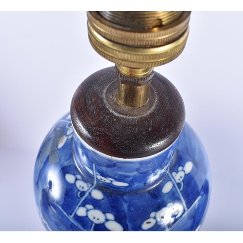 76 - A 19TH CENTURY CHINESE BLUE AND WHITE PORCELAIN PRUNUS LAMP together with a similar ginger jar. Larg... 