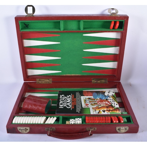 80 - AN ANTIQUE ENGLISH CROCODILE SKIN JEWELLERY BOX together with three leather cases & a cased gaming s... 