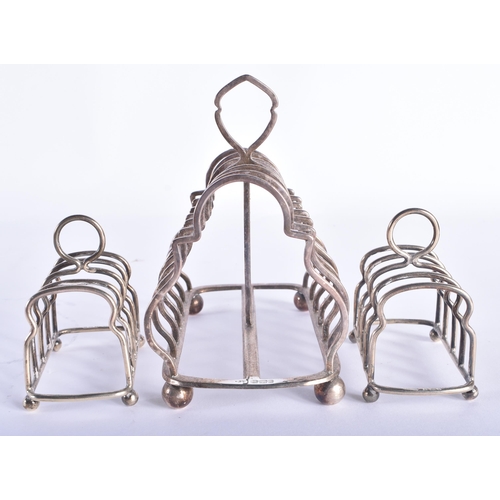 96 - THREE ENGLISH SILVER TOAST RACKS. 267 grams. (3)