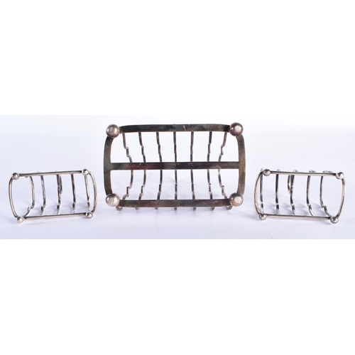 96 - THREE ENGLISH SILVER TOAST RACKS. 267 grams. (3)