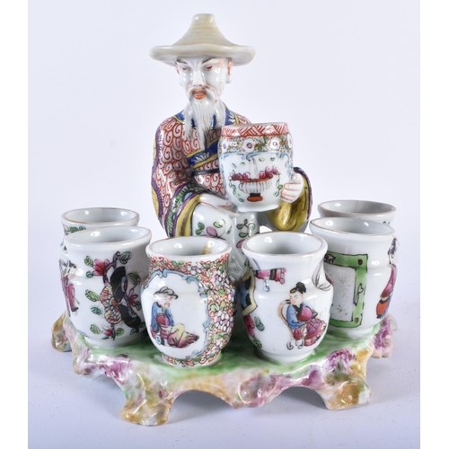 1000 - A VERY RARE 19TH CENTURY EUROPEAN FAMILLE ROSE PORCELAIN FIGURE OF A VASE SELLER modelled in the Chi... 