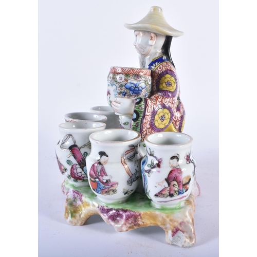 1000 - A VERY RARE 19TH CENTURY EUROPEAN FAMILLE ROSE PORCELAIN FIGURE OF A VASE SELLER modelled in the Chi... 