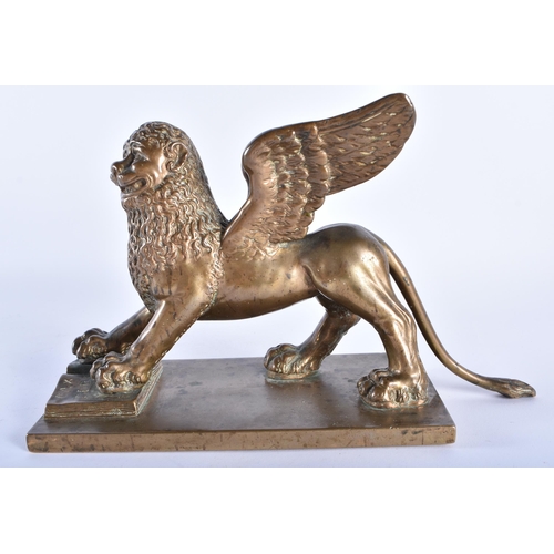 1001 - A FINE 18TH CENTURY EUROPEAN BRONZE FIGURE OF THE LION OF SAINT MARK beautifully modelled upon a rec... 