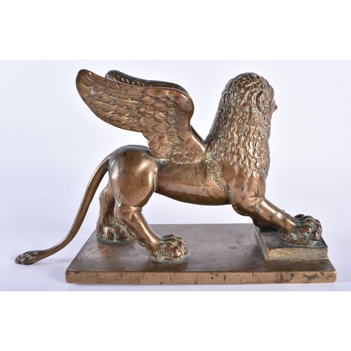 1001 - A FINE 18TH CENTURY EUROPEAN BRONZE FIGURE OF THE LION OF SAINT MARK beautifully modelled upon a rec... 