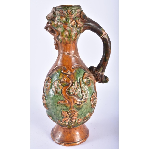 1004 - A RARE CHINESE TANG DYNASTY SANCAI GLAZED PHOENIX AND EQUESTRIAN EWER decorated in relief with arche... 