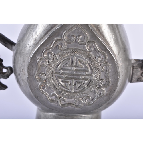 1005 - AN UNUSUAL PAIR OF 19TH CENTURY CHINESE PEWTER EWERS Qing, decorated with a buddhistic emblem. 34 cm... 