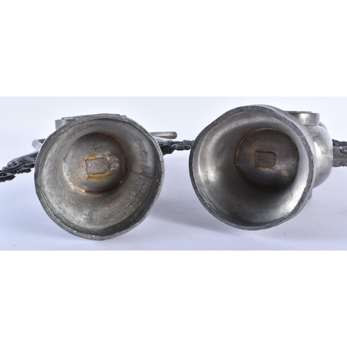 1005 - AN UNUSUAL PAIR OF 19TH CENTURY CHINESE PEWTER EWERS Qing, decorated with a buddhistic emblem. 34 cm... 