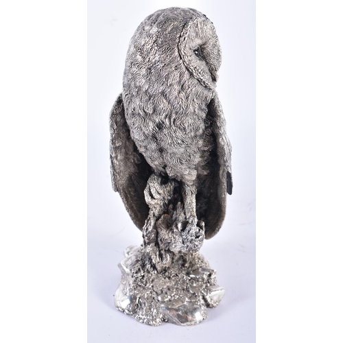 1007 - A MODERN ENGLISH SILVER FILLED MODEL OF A BARN OWL by Keith Sherwin. 991 grams overall. 20 cm high.