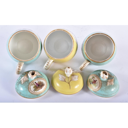 1011 - TWO 19TH CENTURY GERMAN AUGUSTUS REX PORCELAIN CHOCOLATE CUPS AND SAUCERS together with a similar cu... 