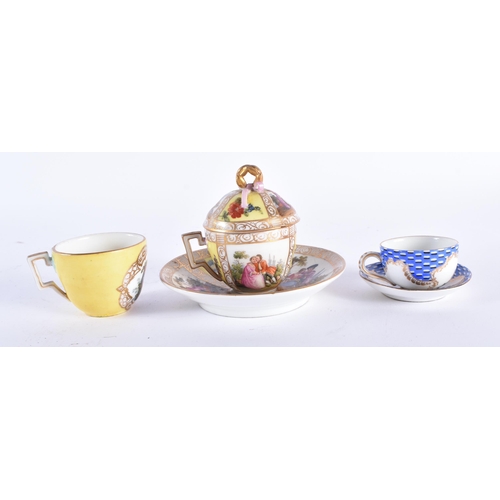 1012 - A 19TH CENTURY GERMAN PORCELAIN CUP AND SAUCER together with an Augustus Rex cup and saucer & a simi... 