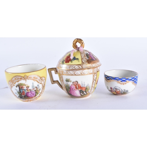 1012 - A 19TH CENTURY GERMAN PORCELAIN CUP AND SAUCER together with an Augustus Rex cup and saucer & a simi... 