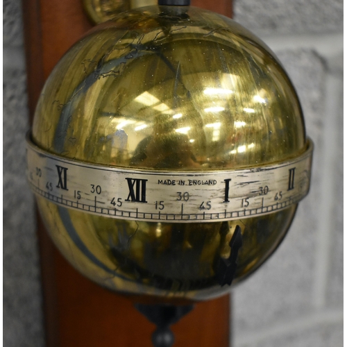 1014 - Thwaites & Reed brass globe gravity clock, circa 1972, limited edition and numbered 247. 66.5 cm hig... 