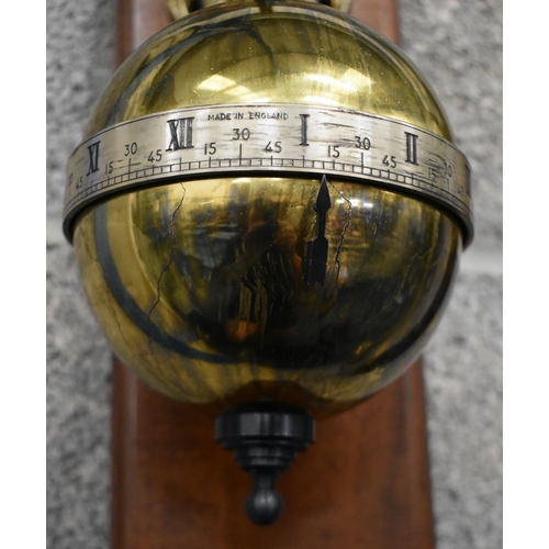 1014 - Thwaites & Reed brass globe gravity clock, circa 1972, limited edition and numbered 247. 66.5 cm hig... 