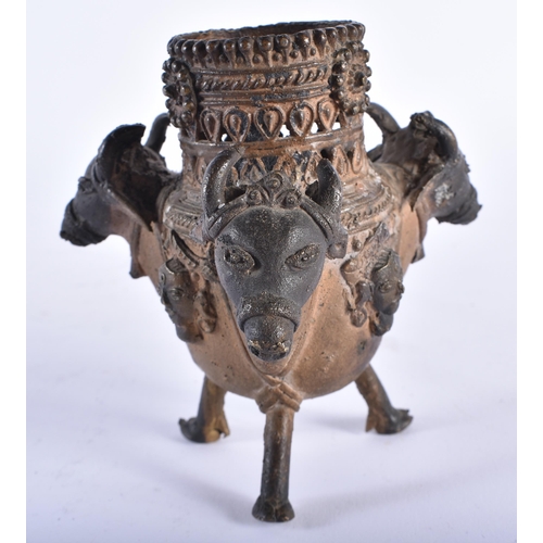 1029 - AN UNUSUAL ANTIQUE INDIAN BRONZE VESSEL. 11.5 cm high.