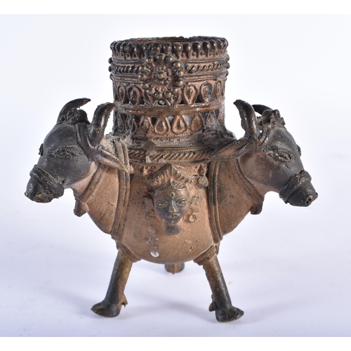 1029 - AN UNUSUAL ANTIQUE INDIAN BRONZE VESSEL. 11.5 cm high.