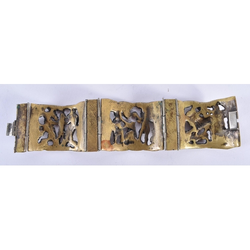 1032 - AN 18TH CENTURY CONTINENTAL BRONZE BRACELET decorated with figures in various pursuits. 18 cm wide.