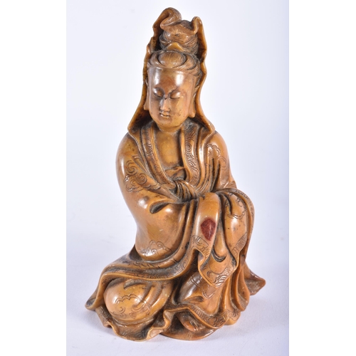 1039 - AN 18TH/19TH CENTURY CHINESE CARVED SOAPSTONE FIGURE OF AN IMMORTAL Qianlong/Jiaqing. 14.5 cm high.