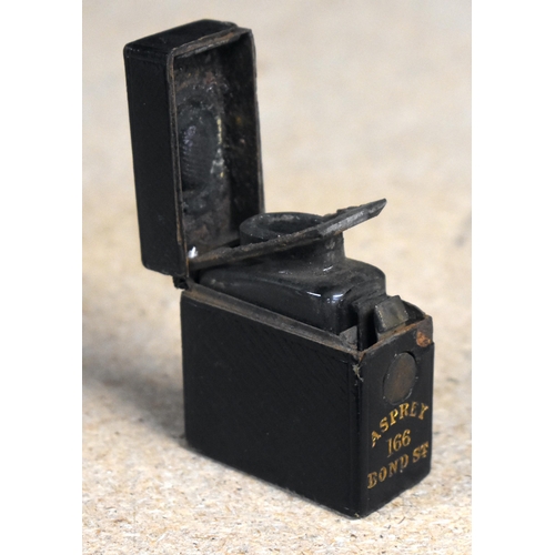 1044 - An Asprey of 166 Bond Street Leather Bound Travel Inkwell.  4cm x 4cm x 2cm