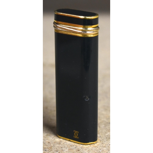 1046 - Cartier Trinity Lighter with Black Lacquer with Gold Trim.  7cm x 2.5cm x 1cm